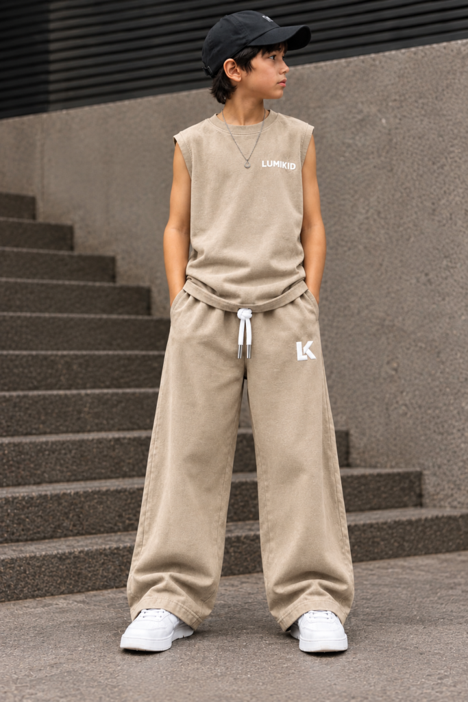 Kid wearing a beige oversized streetwear tank top